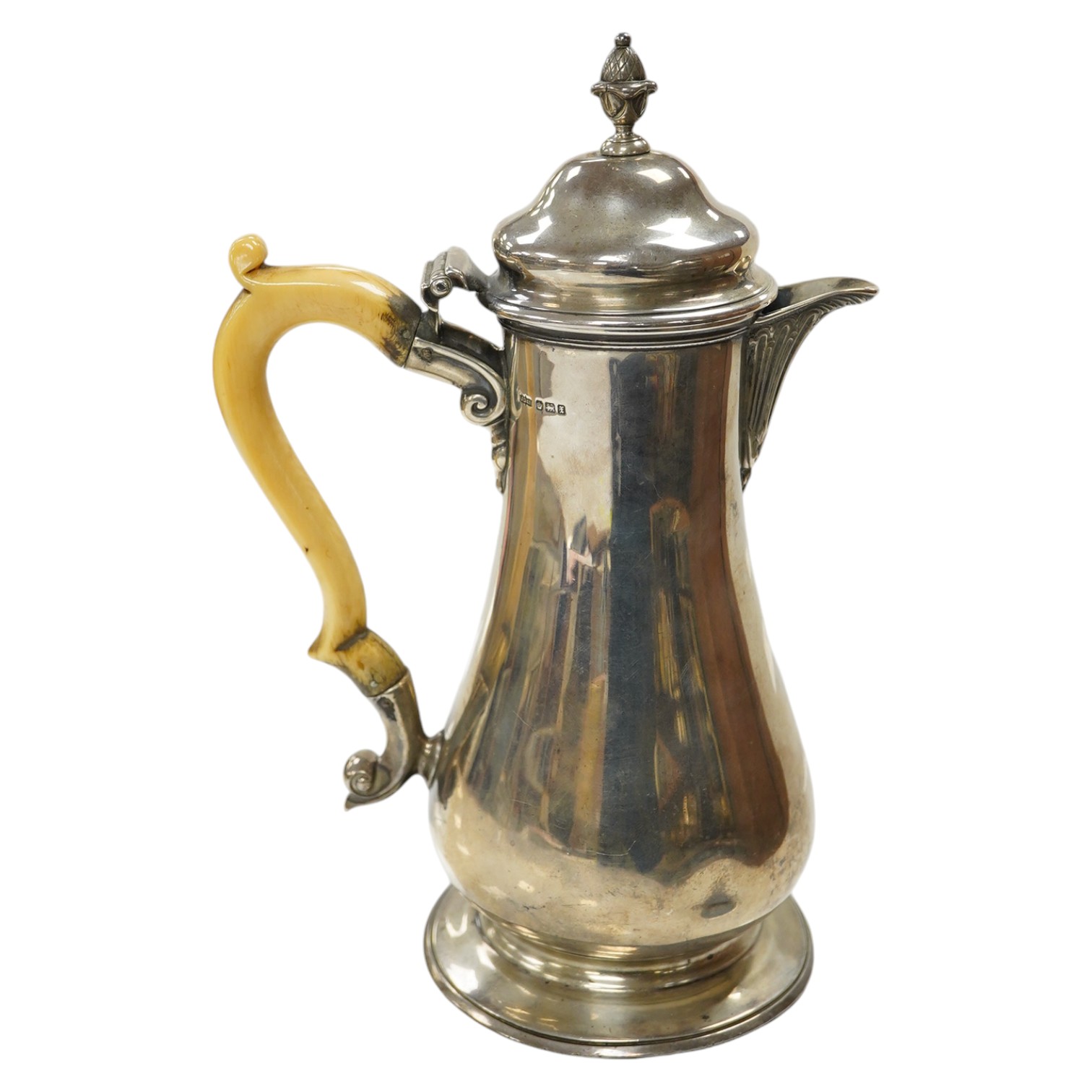 A George V silver baluster hot water pot with ivory handle, makers James Dixon & Sons, Sheffield 1915, gross 19.5 oz, fair to good condition. CITES Submission reference QELNYL3Z